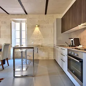 https://vallettastay-orangerie-two-bedroom-apartment-402.hotelssaintjulians.com
